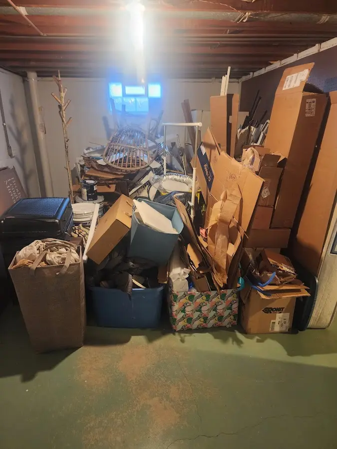 Roll-off dumpster container at job site for Yard Waste Dumpster Rental in Greenwood